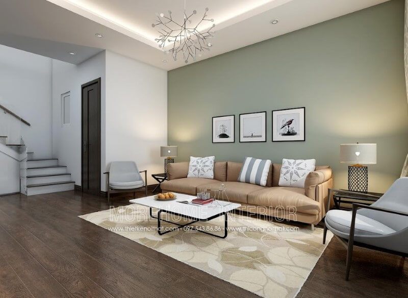 Mẫu bàn trà kết hợp mặt bàn gỗ công nghiệp với chân ghế inox đem đến vẻ đẹp thời thường cho không gian phòng khách