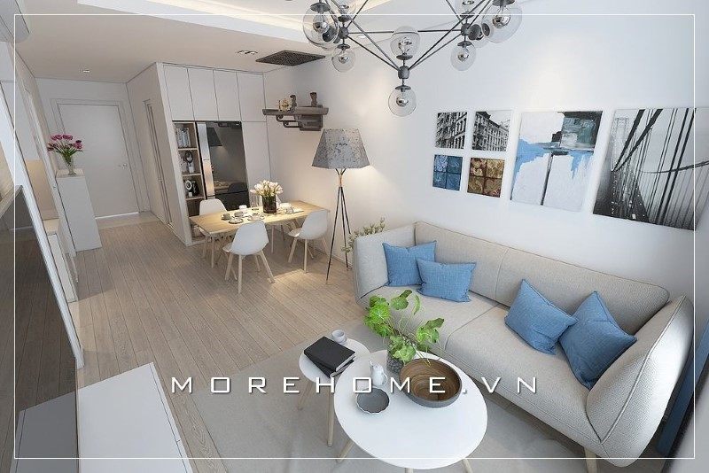 Bàn trà đôi mặt đá màu trắng đóng vai trò là điểm nhấn giúp không gian phòng khách trở nên nổi bật và ấn tượng hơn trong mắt người nhìn.